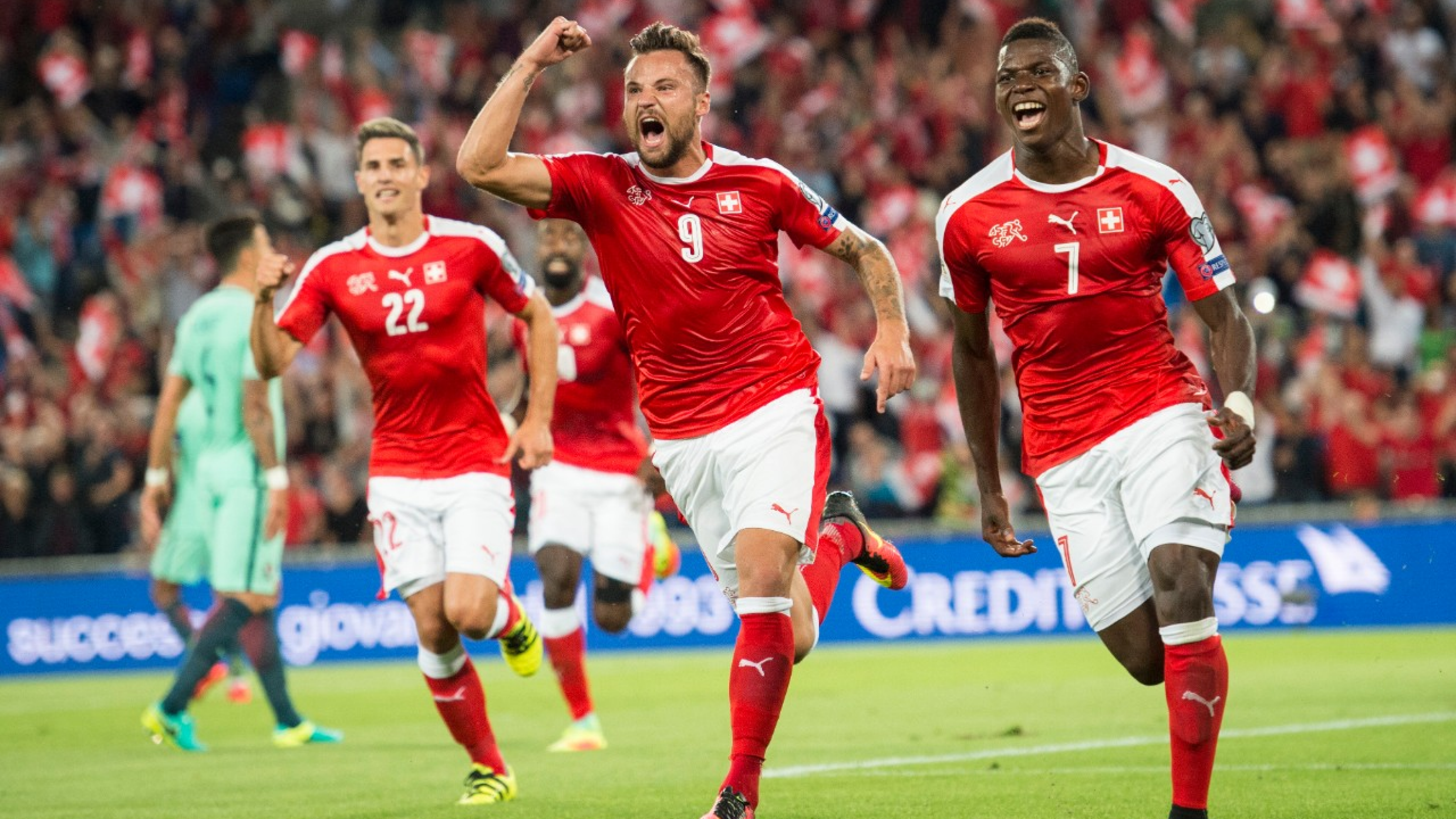 Swiss forwards Haris Seferovic, left, Breel Embolo, right, celebrate the goal during the 2018 Fifa World Cup Russia group B qualification soccer match between Switzerland and Portugal at the St. Jakob-Park stadium, in Basel, Switzerland, Tuesday, September 6, 2016. (KEYSTONE/Ennio Leanza)
