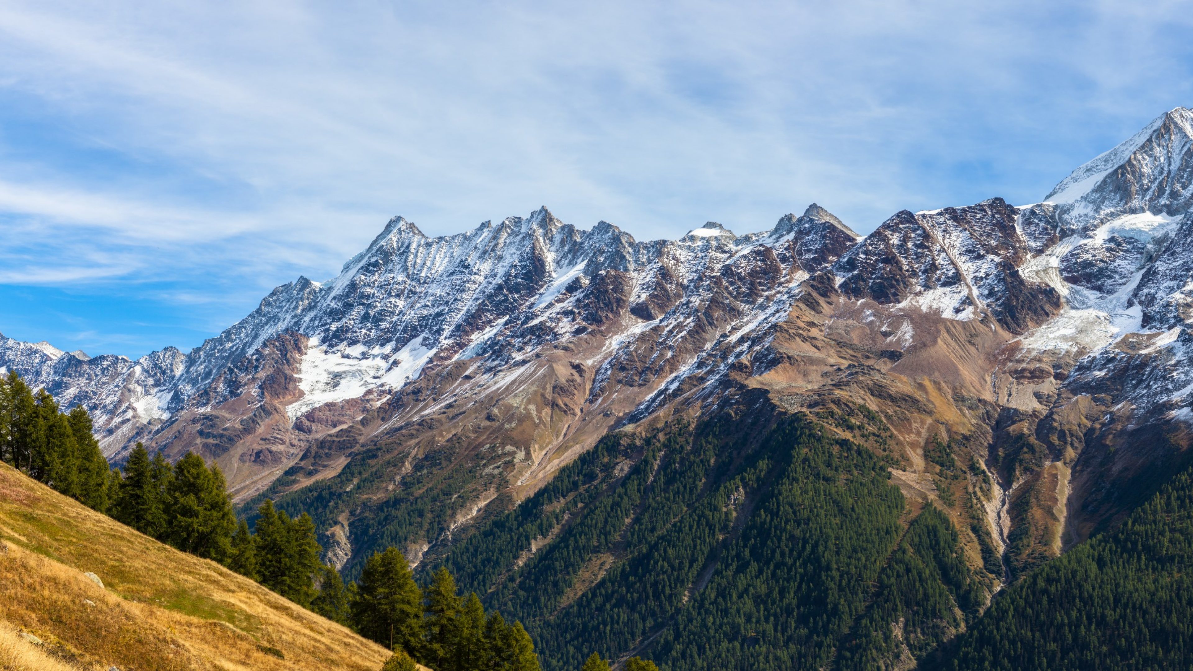 Panorama view of the Bietschhorn and mountain range of alps in canton of Valais from the hiking path above the Loetschental valley, Switzerland.