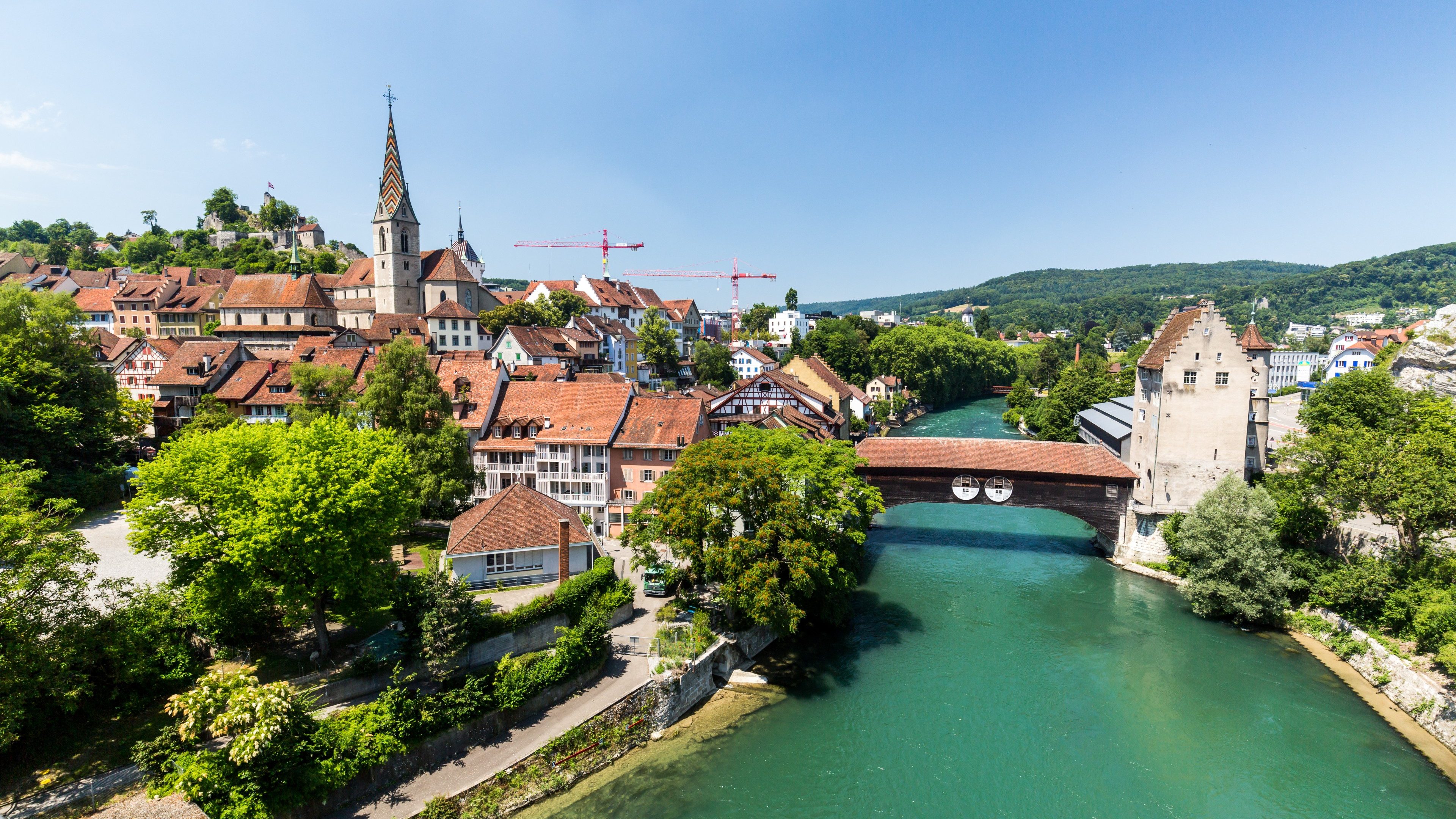 BADEN, AARGAU, SWITZERLAND - JULY 2, 2015: Exterior view from Wettingen side to the  of the city of Baden and river Limmat on June 30, 2015. Baden is a municipality in the Swiss canton of Aargau.