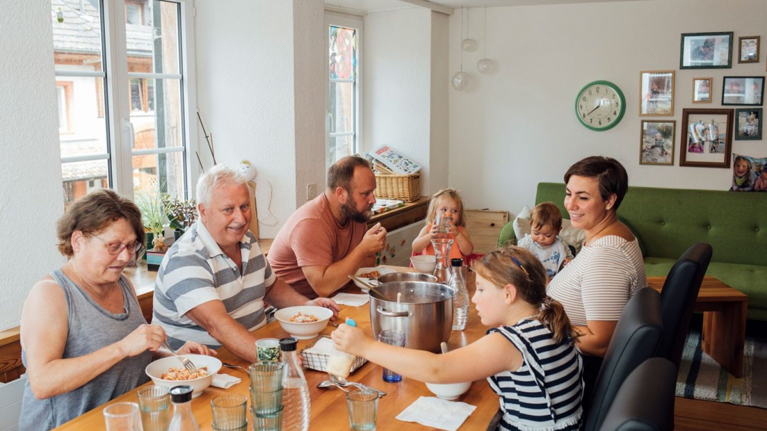 The former weaving room is now the living and dining room. Grandpa Daniele and grandma Eliane Carrara are also at the table.