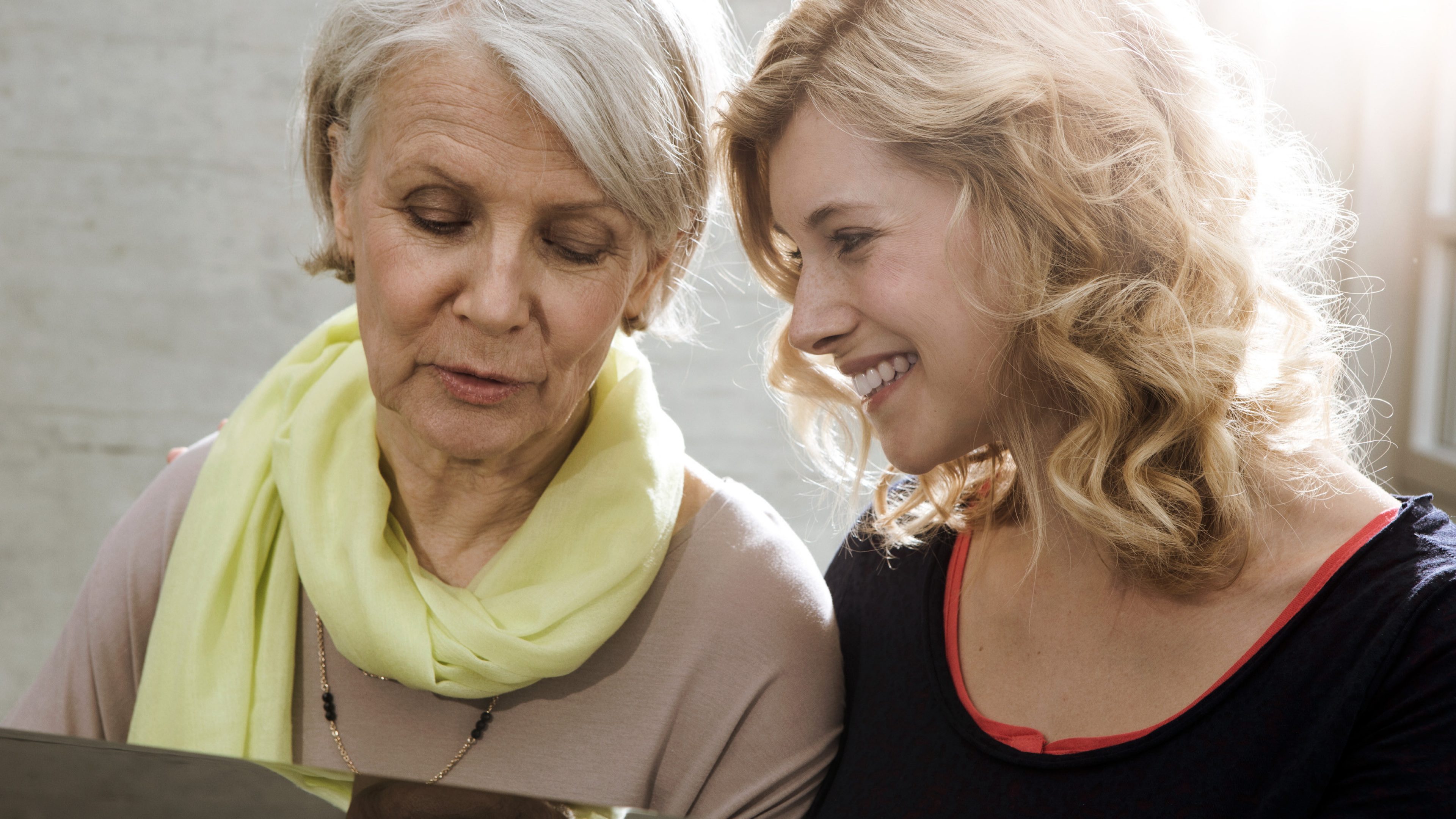 Mother and daughter discuss possible house purchase.