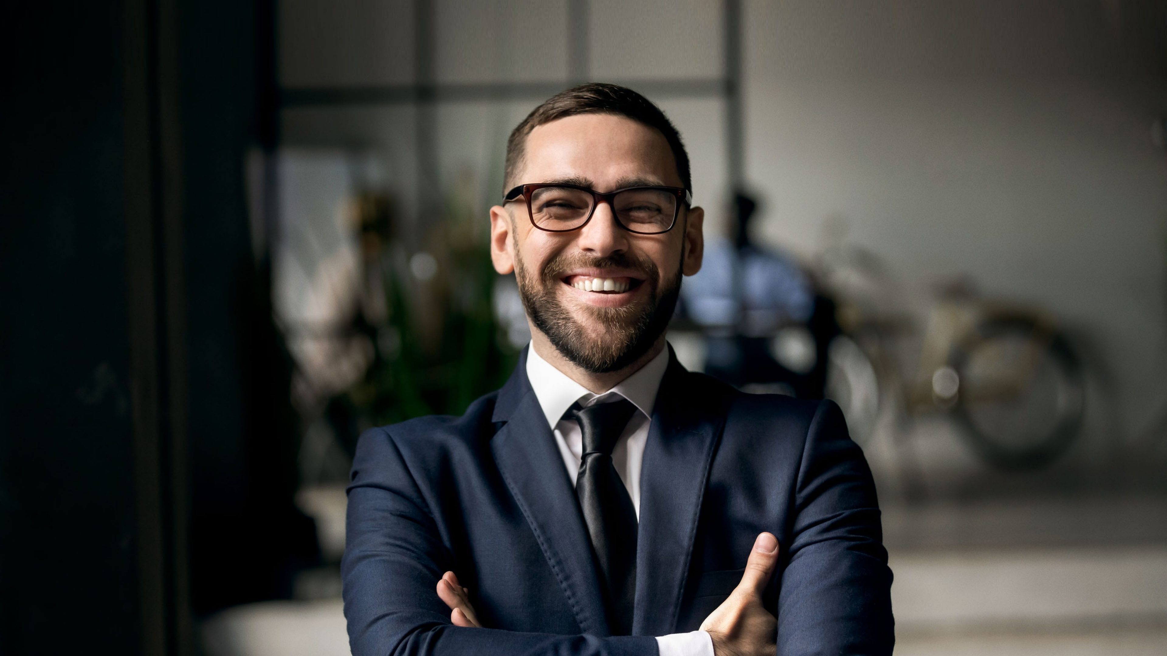 A business man in a suit in a business setting