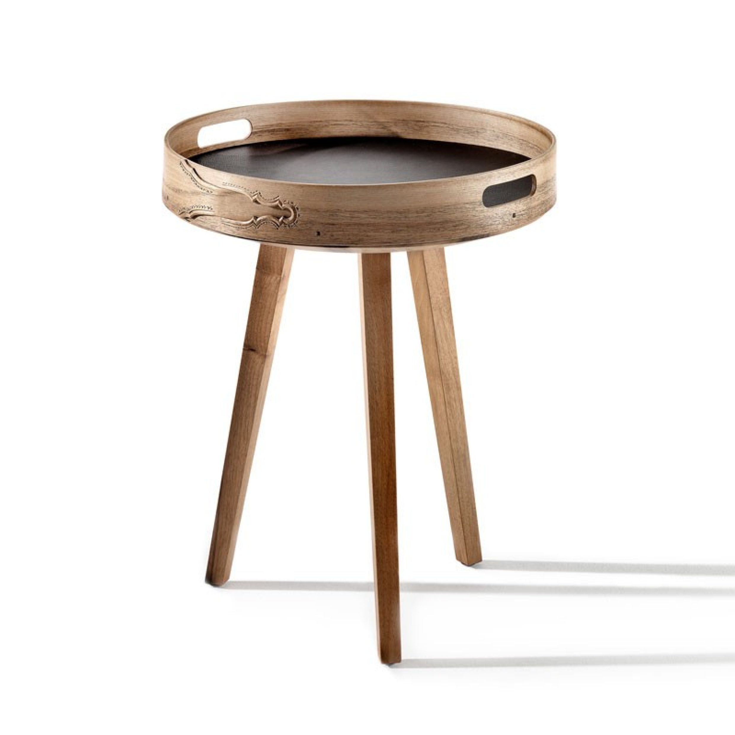 A wooden side table with beautiful carved elements