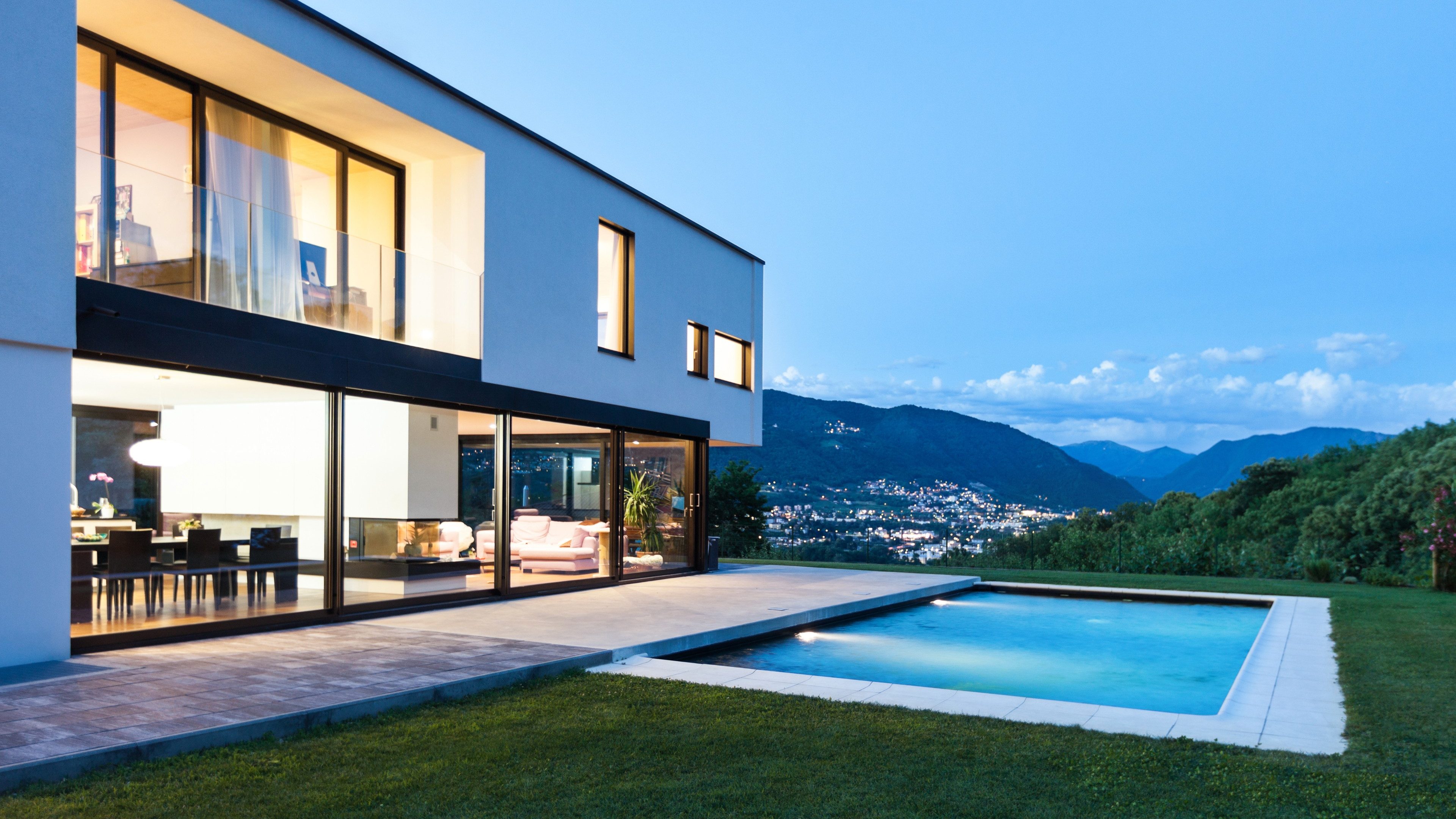 Modern villa with pool, night scene