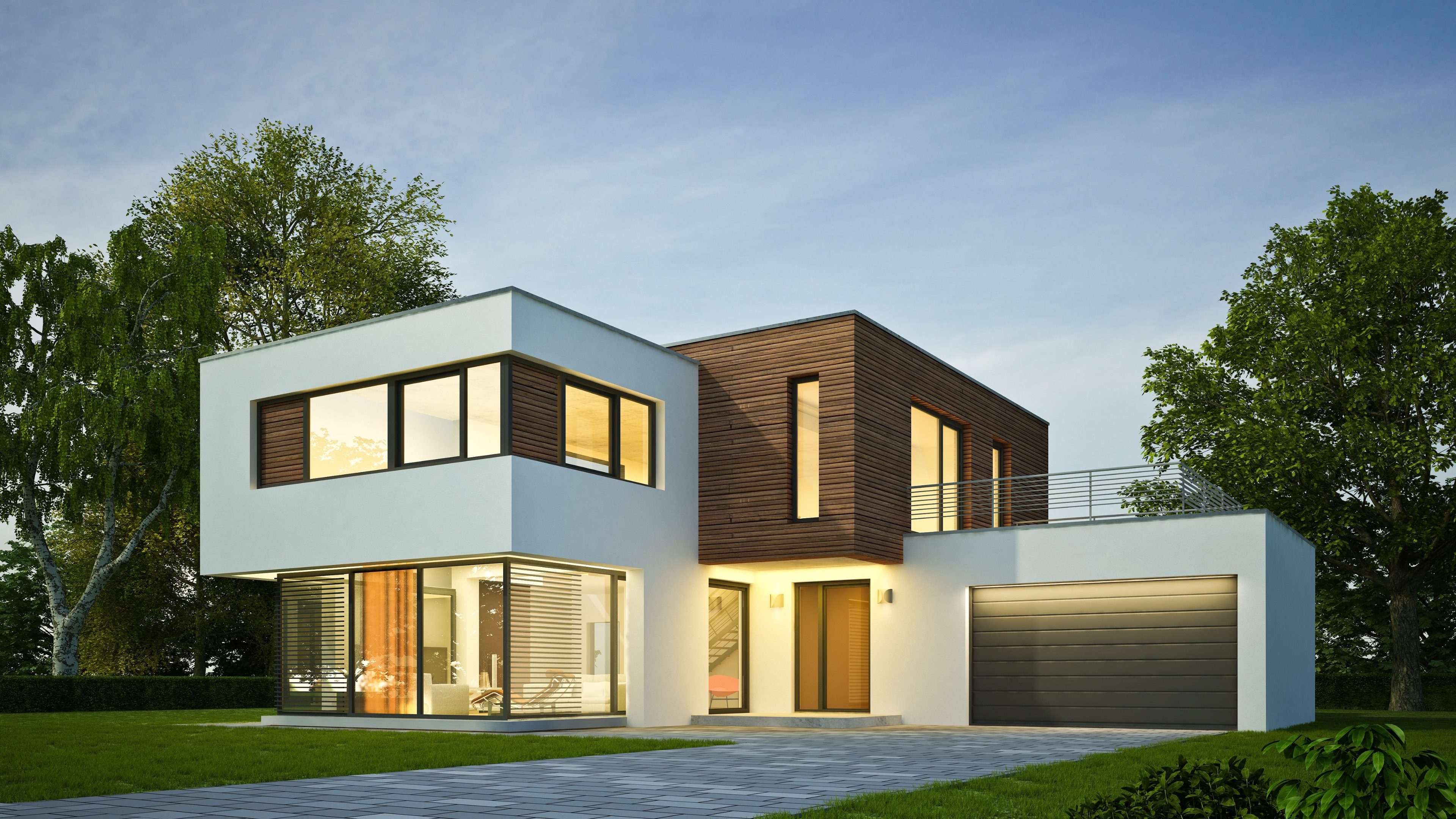 Casa unifamiliare semplice e moderna con balcone, dehors e prato curato senza piante.