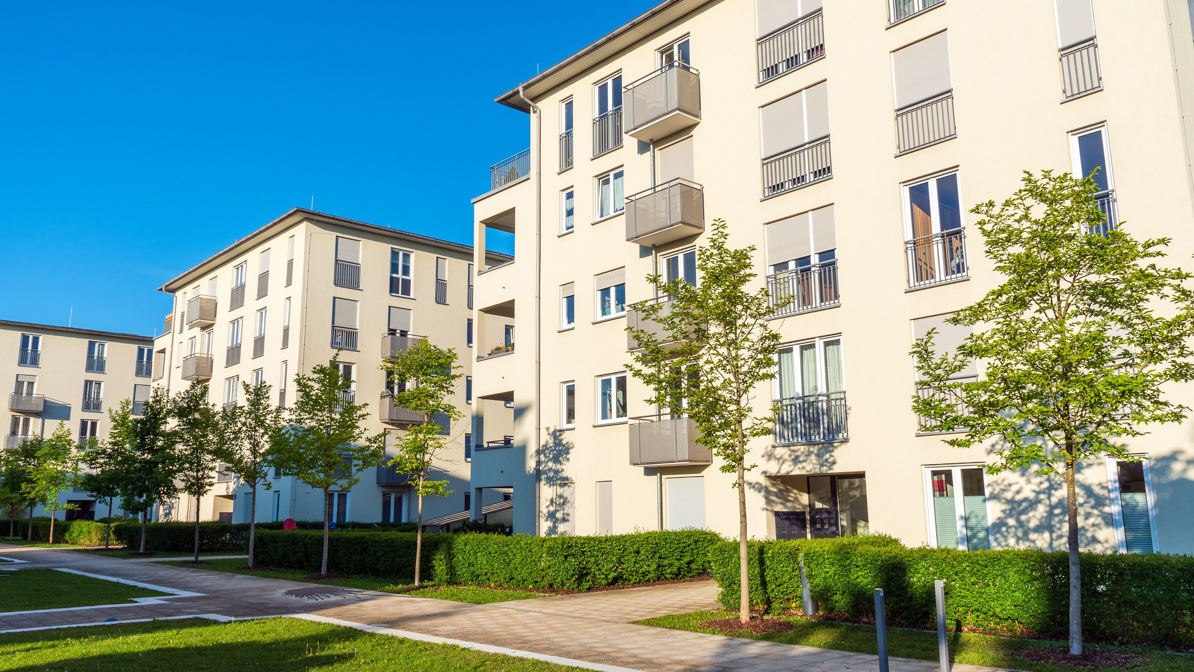 Modern creamy housing construction seen in Munich, Germany